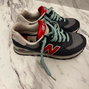 New Balance Black and Red Sneakers with Teal Accents